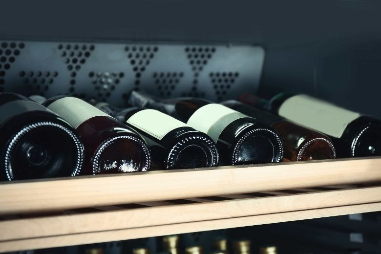 wine bottles stored in cooler